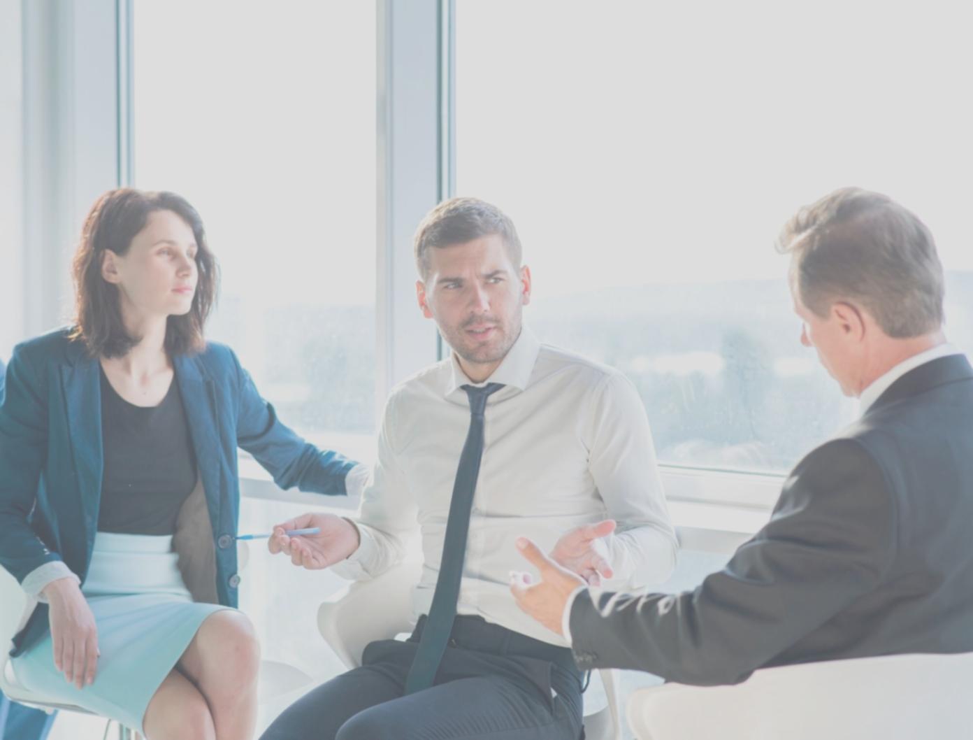 Person reviewing financial statements and planning budget